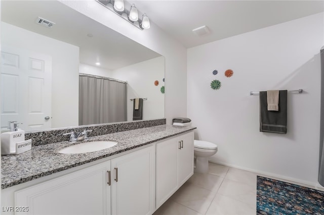 full bathroom featuring tile patterned flooring, visible vents, vanity, and toilet