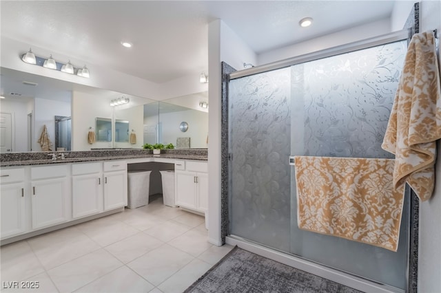 bathroom featuring recessed lighting, an enclosed shower, vanity, and tile patterned floors