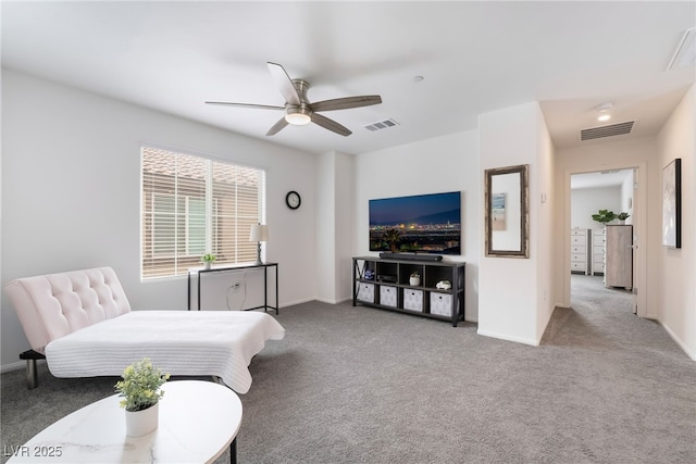 sitting room featuring carpet, visible vents, and baseboards