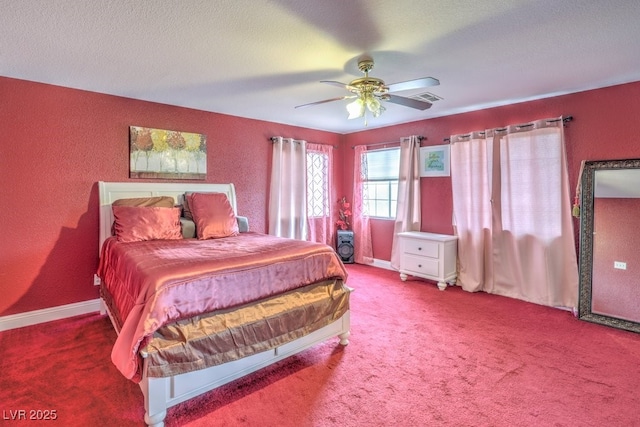 5032 Dancing Lights Ave, Las Vegas, NV 89130 - bedroom featuring carpet flooring, ceiling fan, and a textured wall