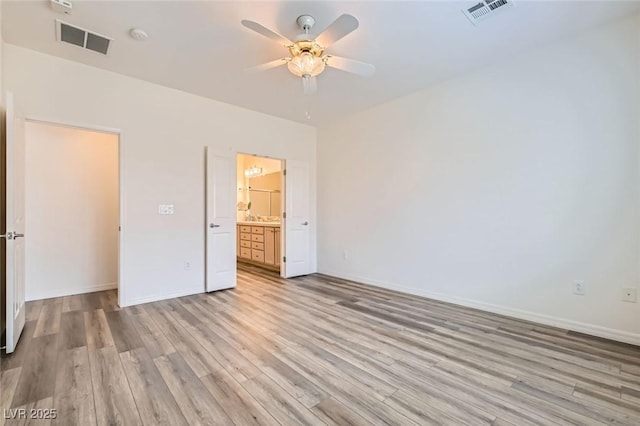 unfurnished bedroom with visible vents, ceiling fan, light wood-style flooring, and baseboards