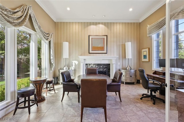 sitting room featuring tile patterned flooring, a premium fireplace, crown molding, and recessed lighting