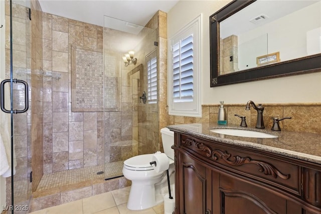 full bath with visible vents, a shower stall, toilet, and tile patterned floors