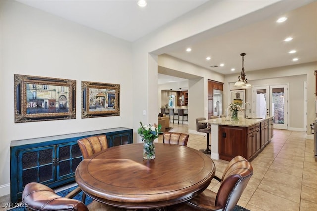 dining area featuring recessed lighting, french doors, and baseboards