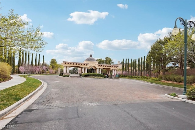 view of street featuring curbs and sidewalks