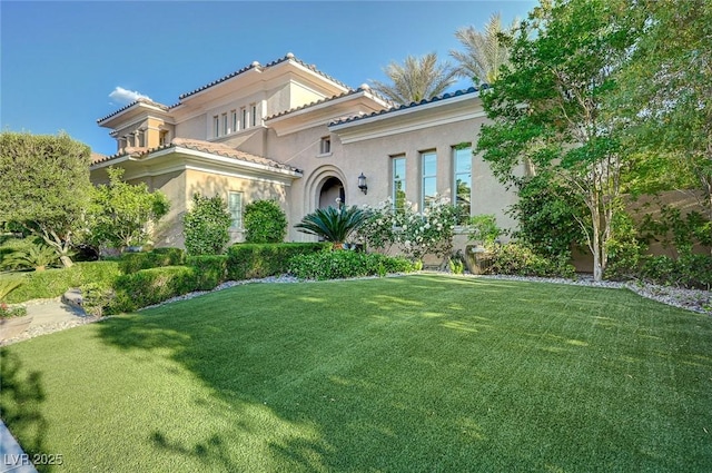 3863 Glasgow Green Dr, Las Vegas, NV 89141 - mediterranean / spanish house with a front yard and stucco siding