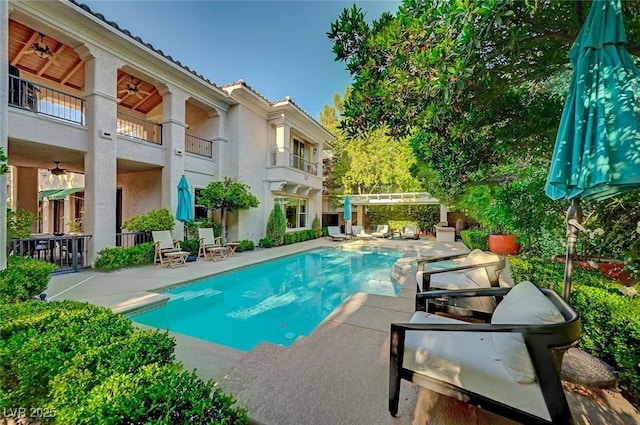 3863 Glasgow Green Dr, Las Vegas, NV 89141 - outdoor pool with a patio area and a ceiling fan