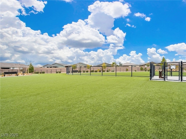 view of yard with a gate and fence