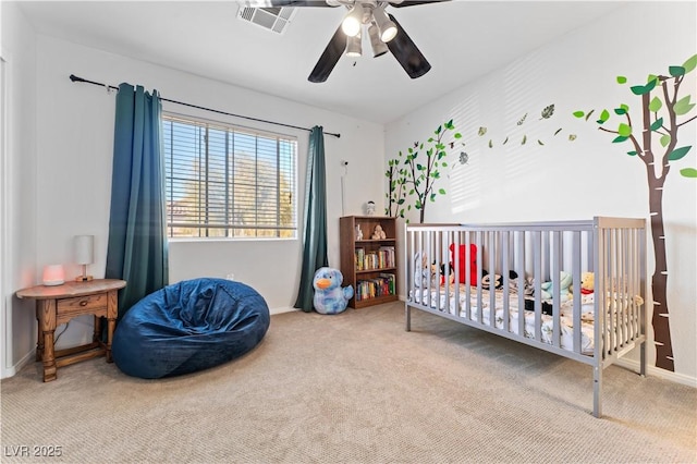 bedroom with carpet flooring, baseboards, visible vents, and ceiling fan