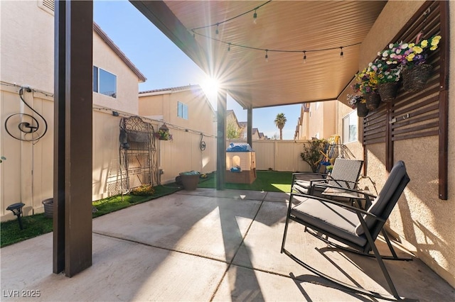 view of patio featuring a fenced backyard