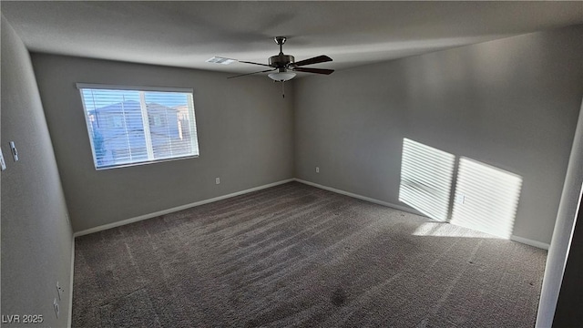 empty room with carpet, baseboards, and ceiling fan