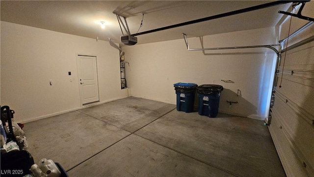 garage featuring a garage door opener