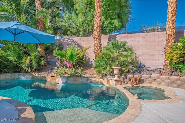 view of pool featuring a fenced in pool, a fenced backyard, and an in ground hot tub