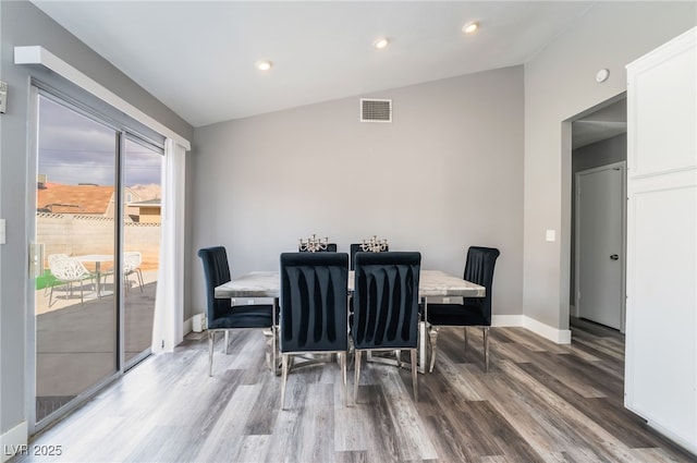 dining area with recessed lighting, wood finished floors, visible vents, and baseboards