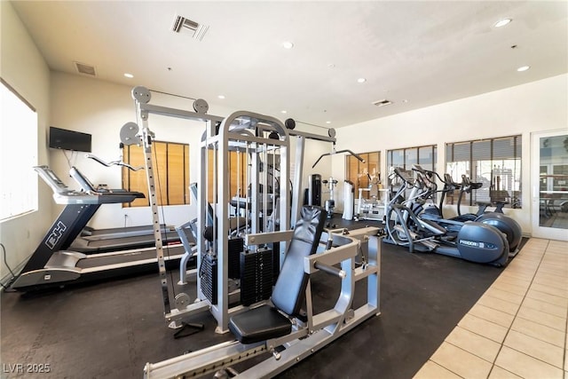 workout area with visible vents and recessed lighting