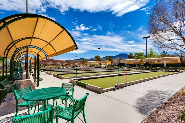 surrounding community featuring a mountain view