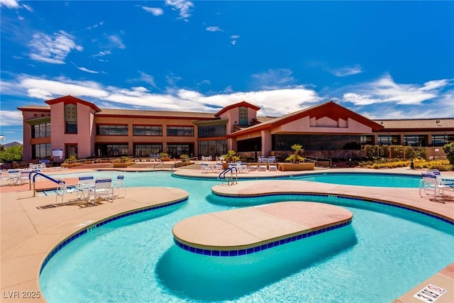 pool with a patio