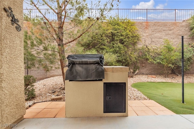 view of patio / terrace with fence