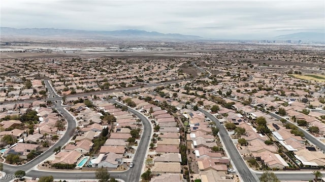 aerial view with a mountain view and a residential view