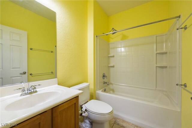 full bathroom with a textured wall, bathtub / shower combination, vanity, and toilet