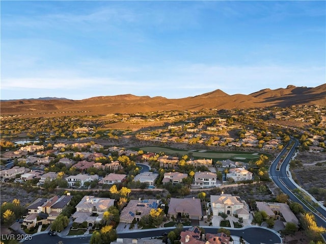 drone / aerial view featuring a mountain view and a residential view