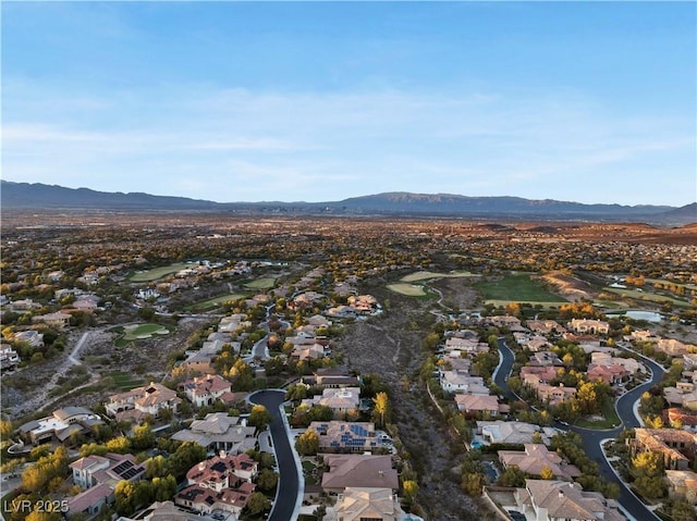 drone / aerial view with a mountain view and a residential view