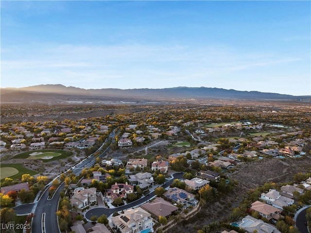 birds eye view of property with a residential view and a mountain view