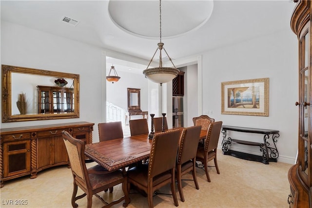 dining room with baseboards and visible vents