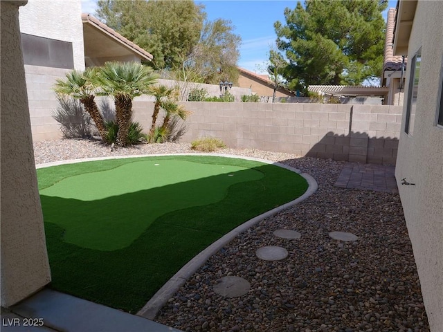 view of yard featuring a fenced backyard