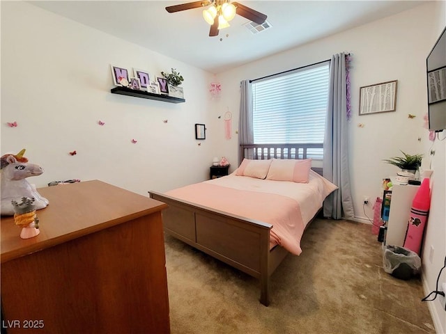 bedroom featuring ceiling fan, visible vents, and light colored carpet