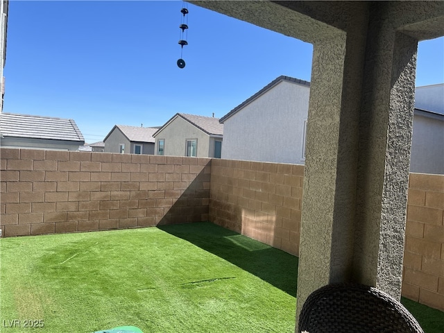 view of yard featuring a fenced backyard