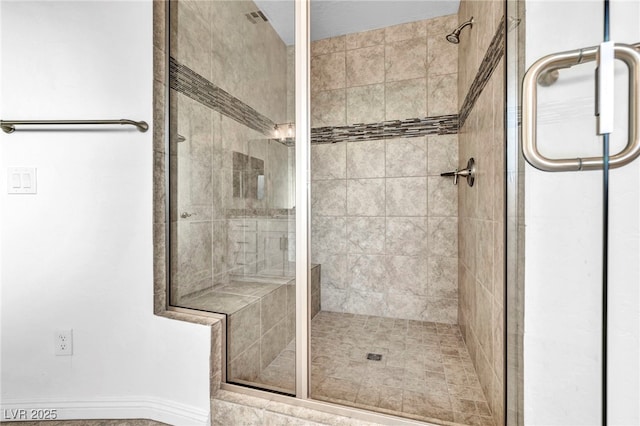 bathroom featuring a stall shower