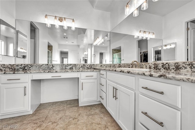 full bathroom featuring an enclosed shower and vanity