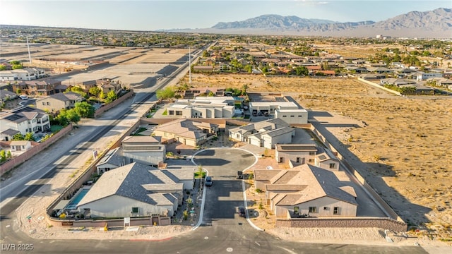 birds eye view of property with a residential view and a mountain view