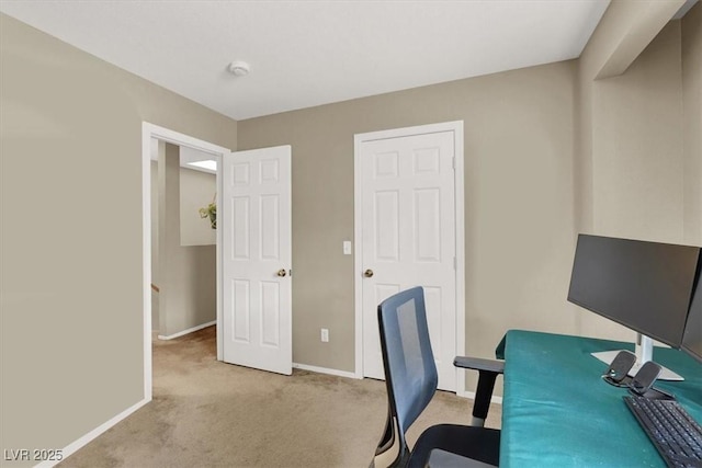 office area featuring carpet floors and baseboards