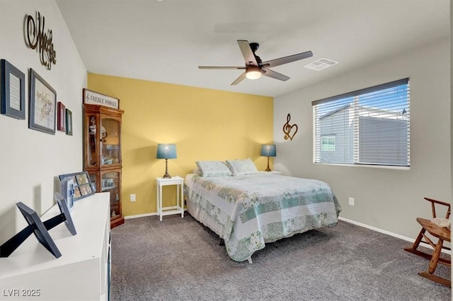 carpeted bedroom featuring visible vents, ceiling fan, and baseboards