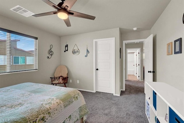 carpeted bedroom with baseboards, visible vents, and a ceiling fan