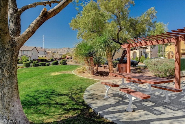 view of yard with a patio area and a pergola