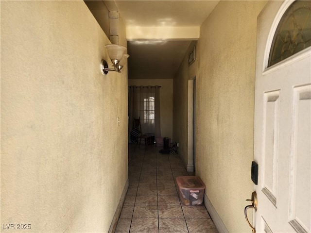 hallway featuring visible vents