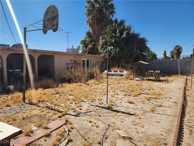 view of yard featuring fence