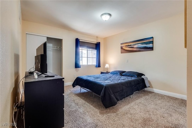 bedroom featuring carpet floors, a closet, and baseboards