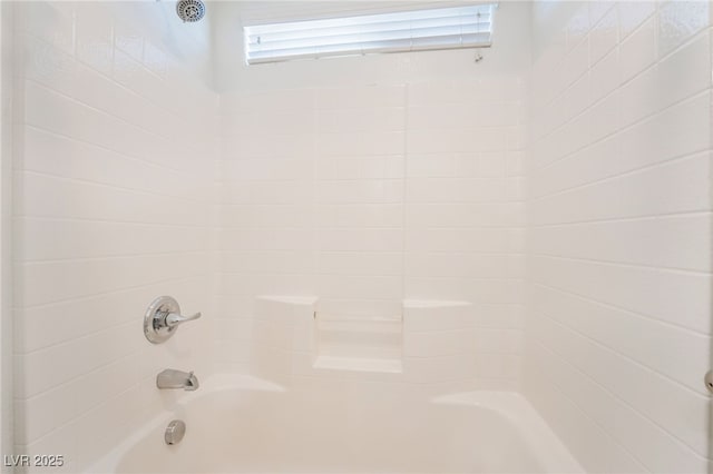 bathroom with shower / bathtub combination