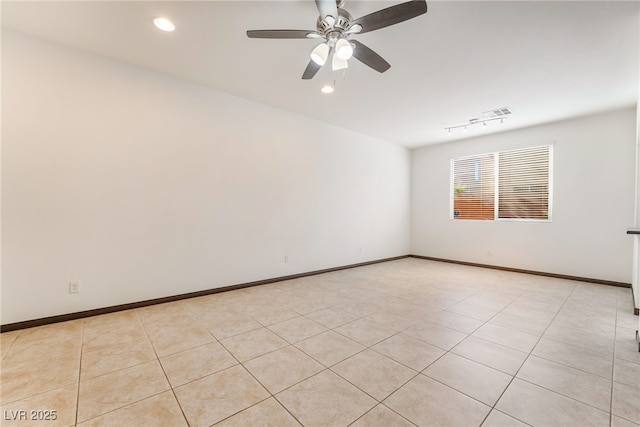 unfurnished room featuring ceiling fan, baseboards, and recessed lighting