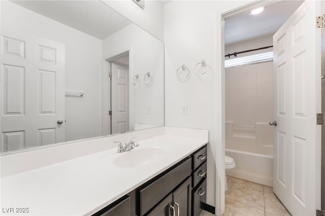 full bath featuring toilet, vanity,  shower combination, and tile patterned floors