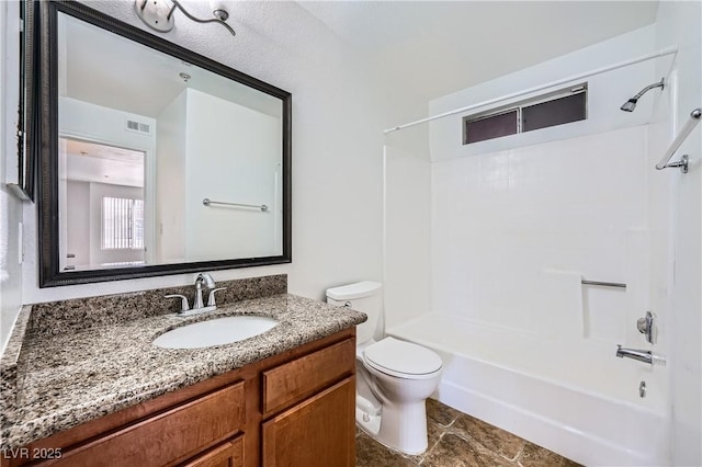 bathroom with visible vents,  shower combination, vanity, and toilet