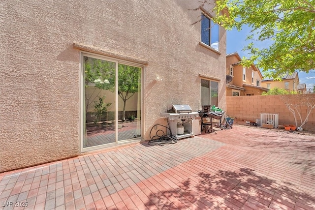 view of patio / terrace featuring fence and area for grilling