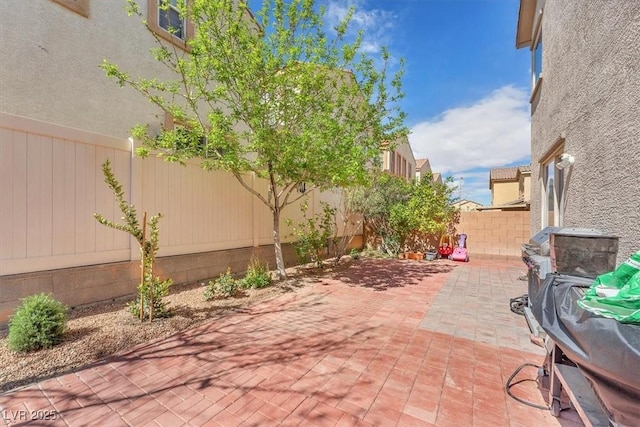 view of patio with a fenced backyard