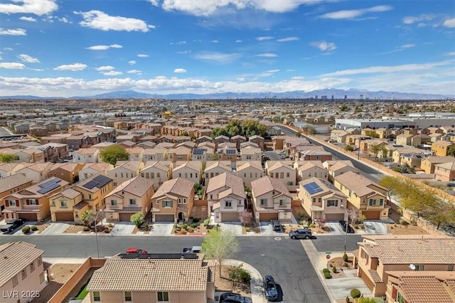 birds eye view of property featuring a residential view and a mountain view