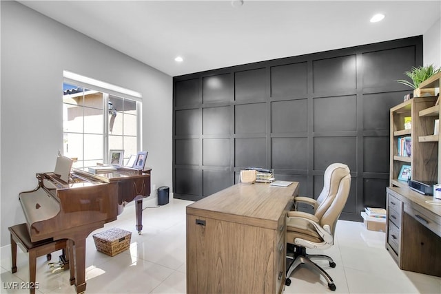 office area with recessed lighting, a decorative wall, and light tile patterned floors