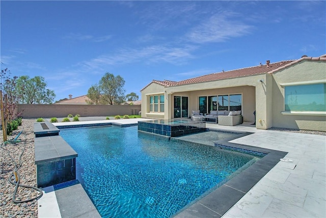 view of pool featuring a patio, outdoor lounge area, a fenced backyard, and a pool with connected hot tub